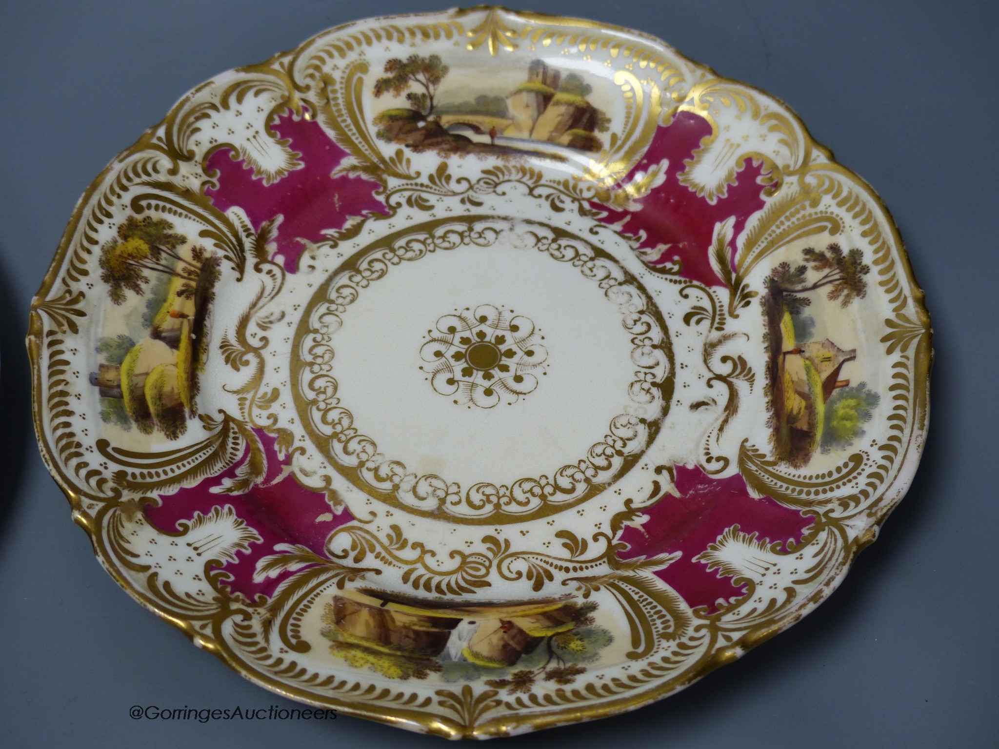 A Spode moulded sauce tureen, cover and stand painted with flowers and a Graingers Worcester sucrier, cover and stand painted with landscapes on a crimson ground